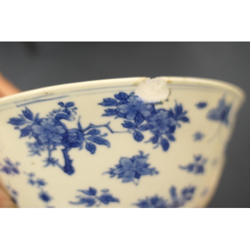 400 - Chinese blue and white bowl, Kangxi (1662-1722), decorated with a myriad of butterflies flying amids... 