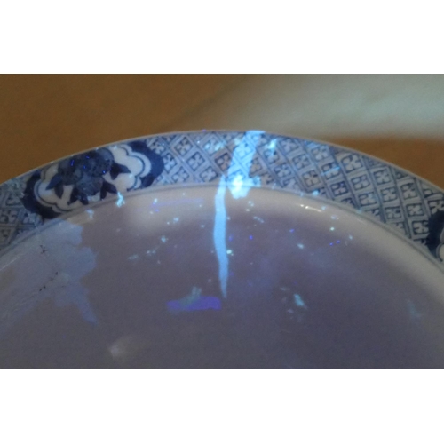 400 - Chinese blue and white bowl, Kangxi (1662-1722), decorated with a myriad of butterflies flying amids... 