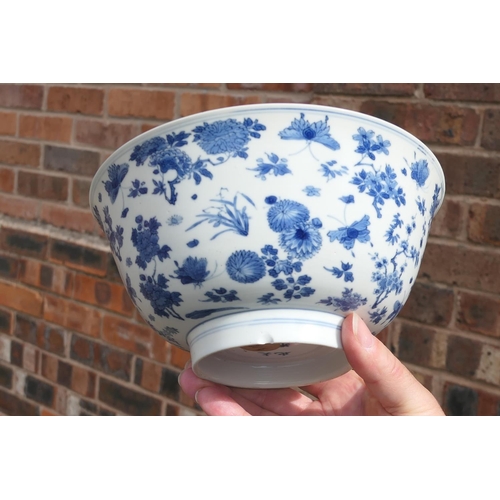 400 - Chinese blue and white bowl, Kangxi (1662-1722), decorated with a myriad of butterflies flying amids... 