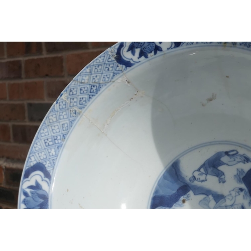 400 - Chinese blue and white bowl, Kangxi (1662-1722), decorated with a myriad of butterflies flying amids... 