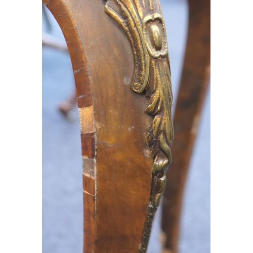 923 - Victorian walnut table in the French style by Howard & Sons, circa 1880, the shaped rectangular top ... 