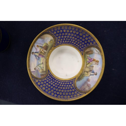 407 - Sevres trembleuse cup and saucer, decorated with panels of figures at a quayside in colours against ... 