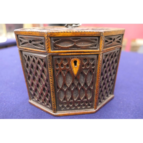 823 - George III mahogany blind fretwork tea caddy, of octagonal form, width 16cm, height 13cm