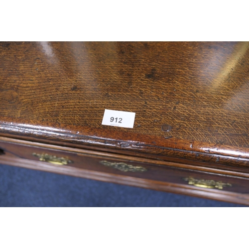 912 - Good Queen Anne oak low dresser, the top with moulded edge over three drawers with later brass fretw... 