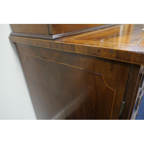 920 - Edwardian mahogany and inlaid double display cabinet in the Sheraton Revival style, having a swan ne... 