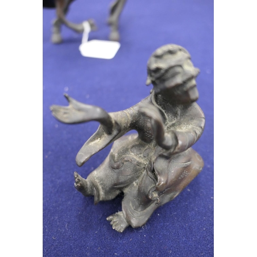 802 - Chinese bronze koro, formed as a man riding a water buffalo, circa 1900, height 19cm