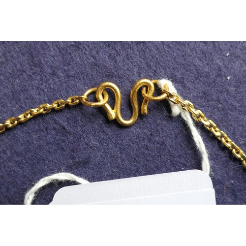 91 - Eastern yellow metal chain link necklace, testing as 22ct, length  62cm, weight approx. 22g