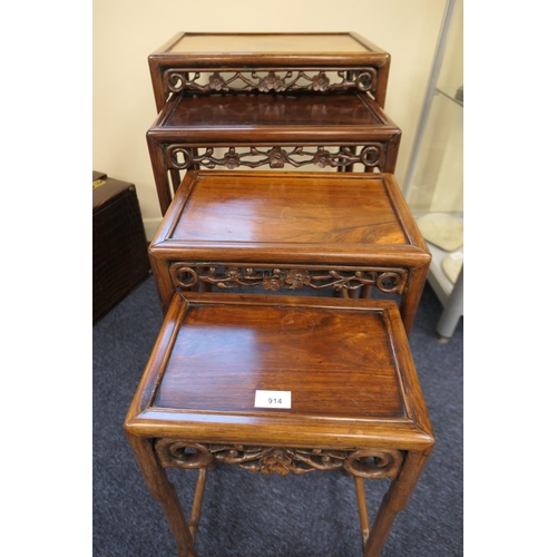 914 - Chinese nest of carved rosewood tables, circa 1900, each having a prunus blossom carved frieze on si... 