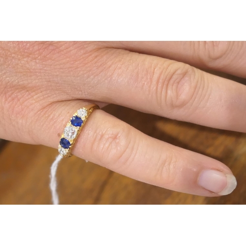 172 - Sapphire and diamond five stone ring in 18ct yellow gold, the central old round cut diamond of appro... 