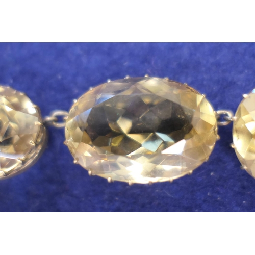 204 - Citrine riviere necklace, the oval cut faceted stones graduating in size and with a single pendant s... 