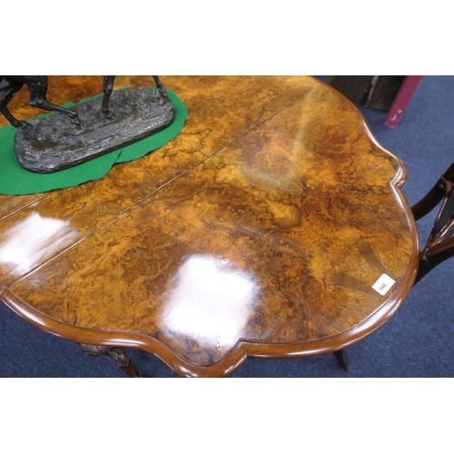 948 - Victorian burr walnut Sutherland table, quarter veneered shaped drop leaves over fluted baluster col... 