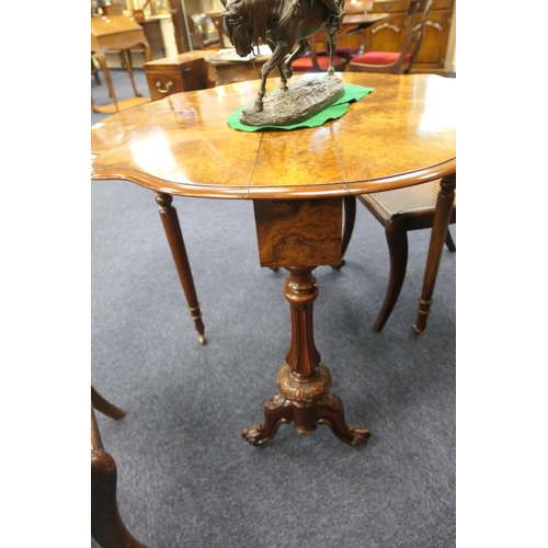 948 - Victorian burr walnut Sutherland table, quarter veneered shaped drop leaves over fluted baluster col... 