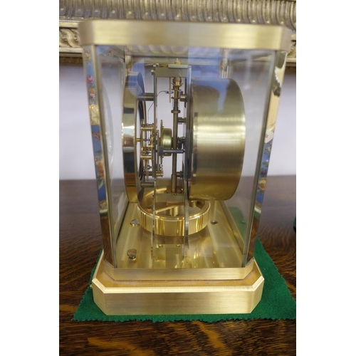 902 - Jaeger LeCoultre brass Atmos clock, with Arabic and baton numerals, numbered 301306, height 23.5cm, ... 