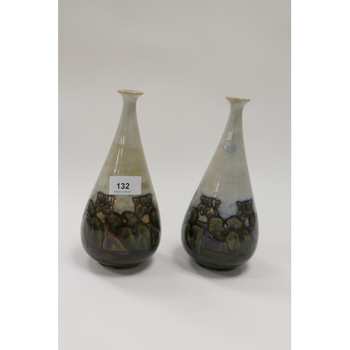 132 - Pair of Royal Doulton stoneware bottle vases, height 22cm