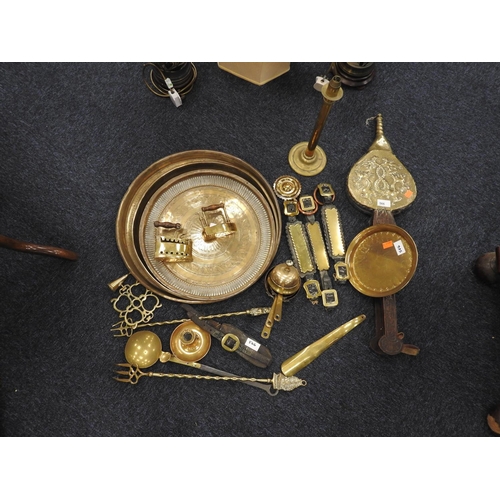 566 - Assorted brass and copper wares including Victorian martingales, 19th Century brass and steel ladle,... 