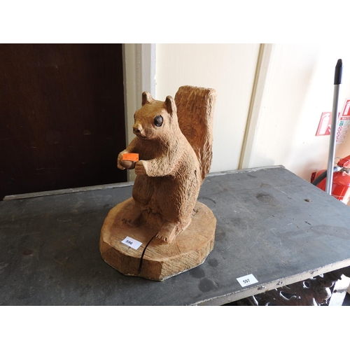 596 - Hand carved wooden squirrel garden ornament, height 35cm