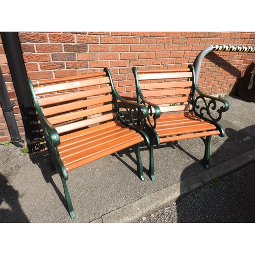 601 - Pair of sturdy cast metal and wooden slatted garden chairs, each 65cm wide