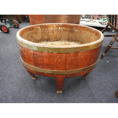 648 - 19th Century mahogany and brass banded oval wine cooler, width 63cm, height 55cm