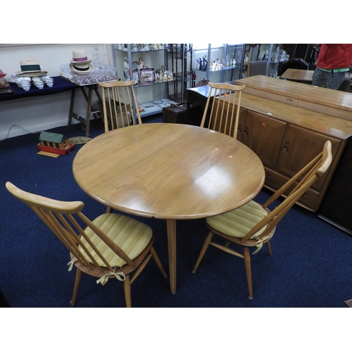 672 - Ercol blond elm drop leaf dining table, width 108cm, together with four stick back dining chairs (5)