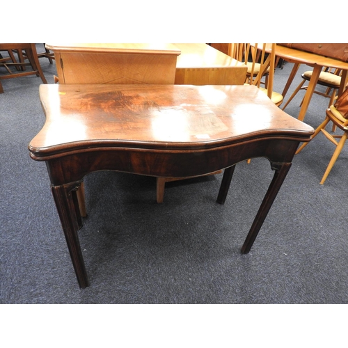 675 - George III mahogany serpentine folding card table, circa 1760-80, raised on ogee moulded chamfered s... 