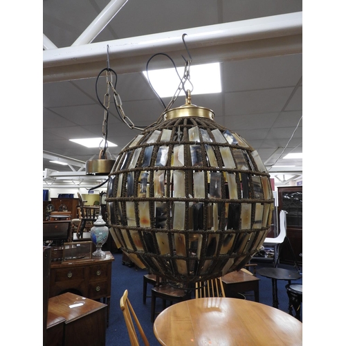 676 - Decorative spherical light pendant shaded with chamfered horn tiles, 60cm drop