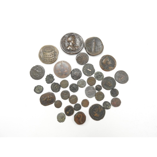 Assorted Roman bronze coins, other middle eastern ancient coins, and a ...