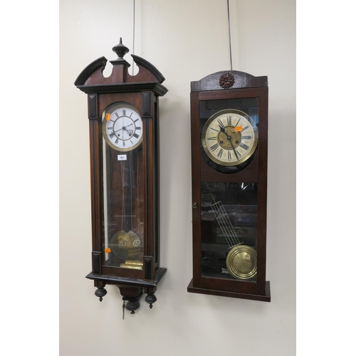 593 - Vienna walnut and ebonised twin weight wall clock, also an oak cased wall clock (2)