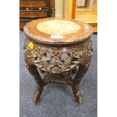 595 - Chinese carved hardwood jardiniere stand with marble inset top, 28cm diameter, height 38cm