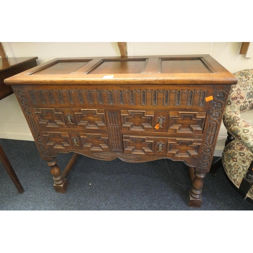 618 - Tudor Revival oak moulded mule chest with drawers and lift up hinged top, width 95cm, height 78cm