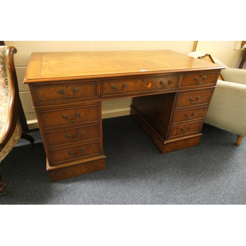 626 - Burr walnut nine drawer kneehole desk in the Georgian style, width 138cm, depth 76cm, height 77cm