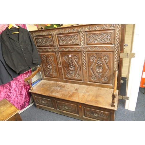 630 - 18th Century oak fielded panel box settle, with later carved decoration, width 187cm, height 155cm, ... 