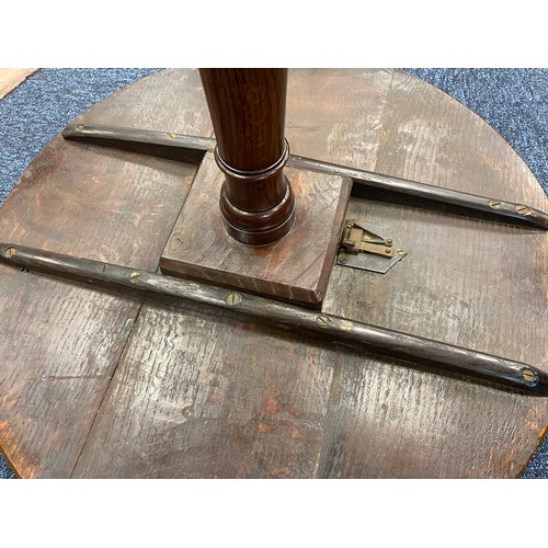 590 - 19th Century oak tilt top pedestal tripod table, 64cm diameter, height 68.5cm