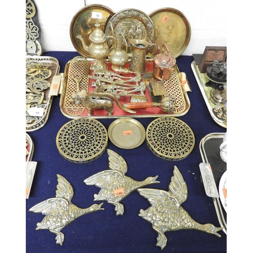 65 - Assortment of ornamental brassware including three flying ducks