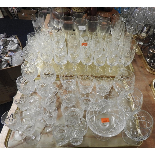 79 - Quantity of mixed cut and moulded glassware including pedestal wines, champagne flutes, brandy ballo... 