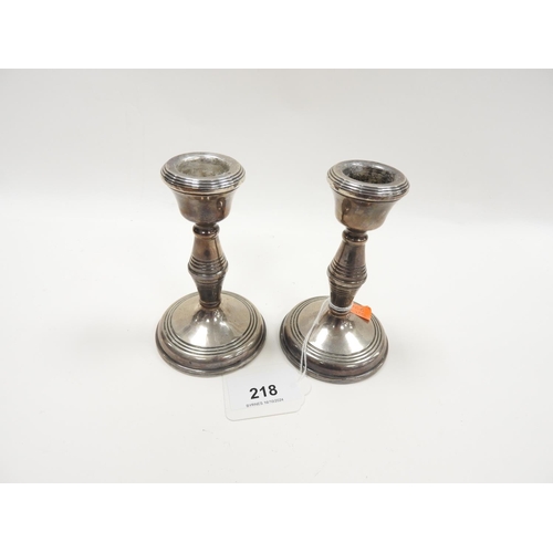 218 - Pair of silver dwarf candlesticks, Birmingham 1973 (loaded), height 11cm