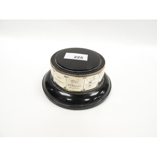 225 - Ebonised socle with six sterling silver presentation labels