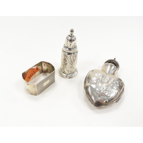 233 - Edwardian silver heart shaped scent bottle case, London 1910, 8.5cm, also a silver pepperette, Londo... 