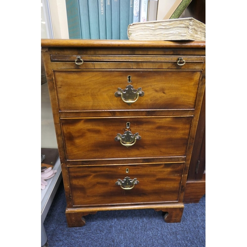 584 - Small mahogany chest of three drawers with brushing slide, width 52cm, height 74cm