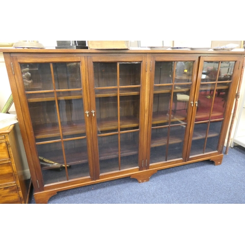 598 - Edwardian mahogany four door bookcase with adjustable shelves, width 197cm, height 120cm, depth 33cm