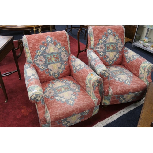 614 - Pair of red patterned fabric upholstered deep easy chairs