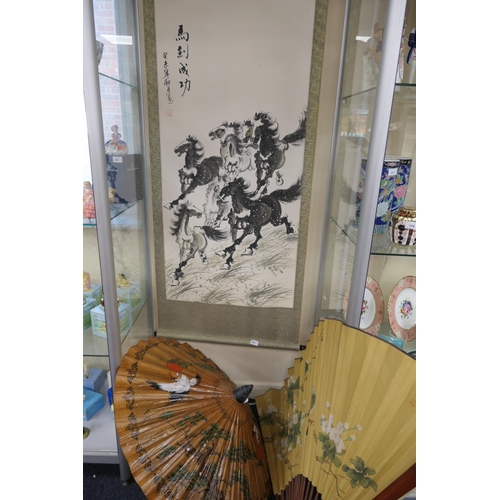 615 - Chinese scroll print of wild horses, 177cm x 70cm, also a large hand decorated Japanese fan and a Ja... 