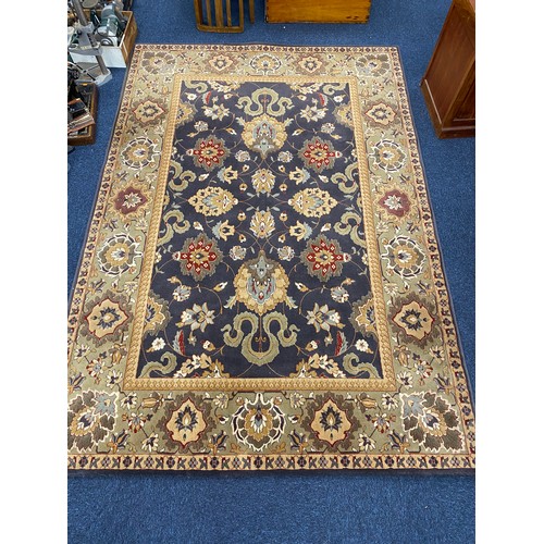 577 - Belgian green ground woollen carpet by Kennedy Carpets, 295cm x 205cm