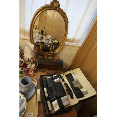 45 - Gentleman's vanity set, pair of brass candlesticks, walnut glove box, gilded oval wall mirror etc