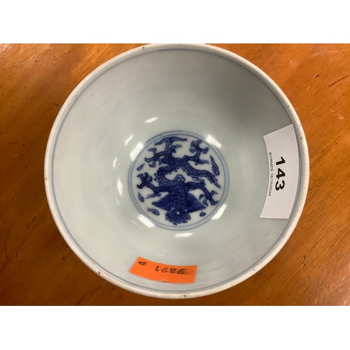 143 - Chinese blue and white dragon bowl with Ming six character mark but 20th Century, 10cm diameter