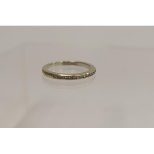 209 - Diamond half eternity ring in 18ct gold, size M, gross weight approx. 2.6g