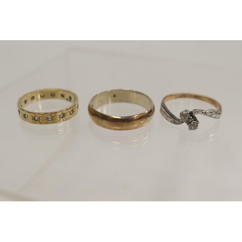 215 - 9ct gold and white gem stone eternity ring, size K, weight approx. 2g; also a diamond crossover ring... 