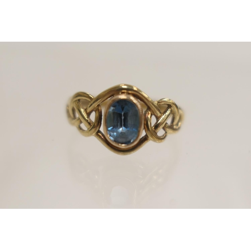 216 - Clogau 9ct gold Celtic design ring, set with oval cut blue topaz, size P, gross weight approx. 2.2g