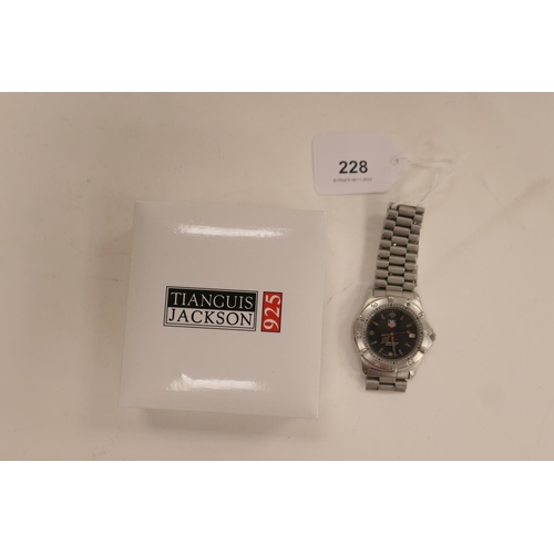 228 - Tag Heuer WE1110-R gent's stainless steel quartz wristwatch (currently not working), no box or paper... 