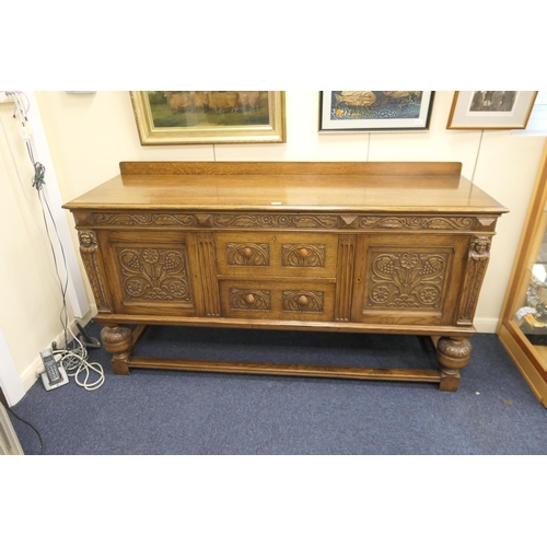 273 - Quality carved oak sideboard in the Elizabethan style retailed by Waring & Gillow width 182cm, heigh... 