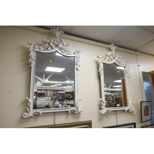 275 - Pair of painted moulded frame wall mirrors in Baroque style, width 60cm